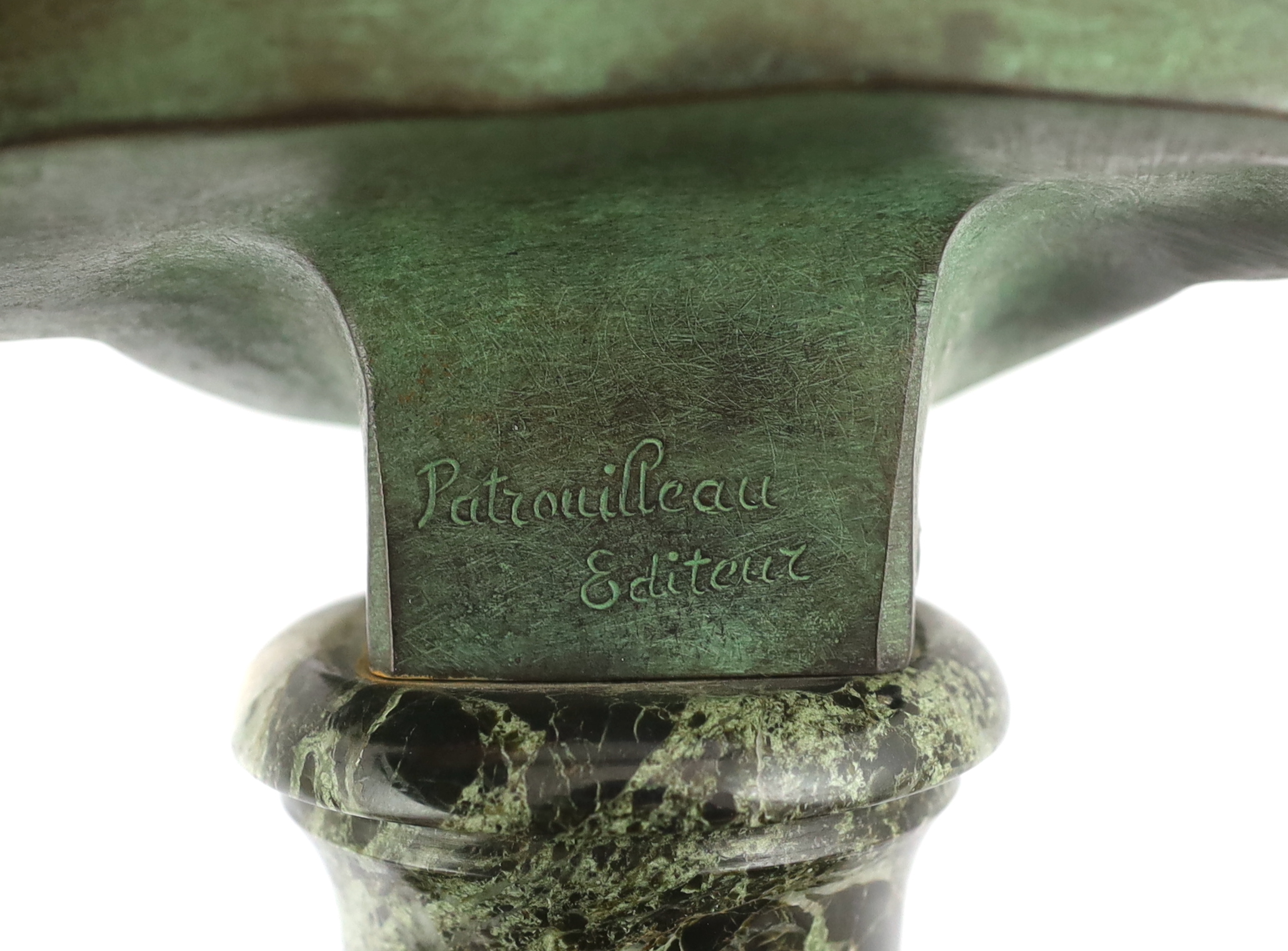 After Jean-Antoine Houdon (1741-1828), a green patinated bronze bust of a child, signed with Patrouilleau éditeur signature in the bronze, on a variegated green marble socle, 35cm high. Condition - good